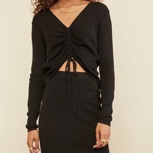Black sweater with ruched front